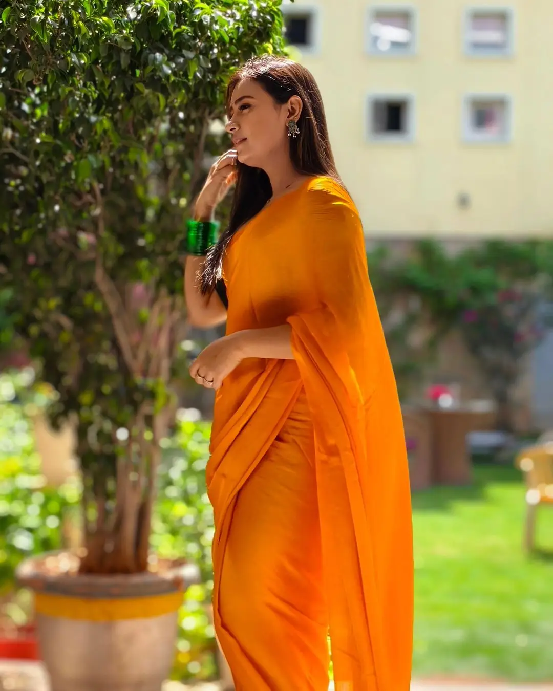 Telugu TV Actress Deepa Jagadeesh Stills In Orange Saree Green Blouse